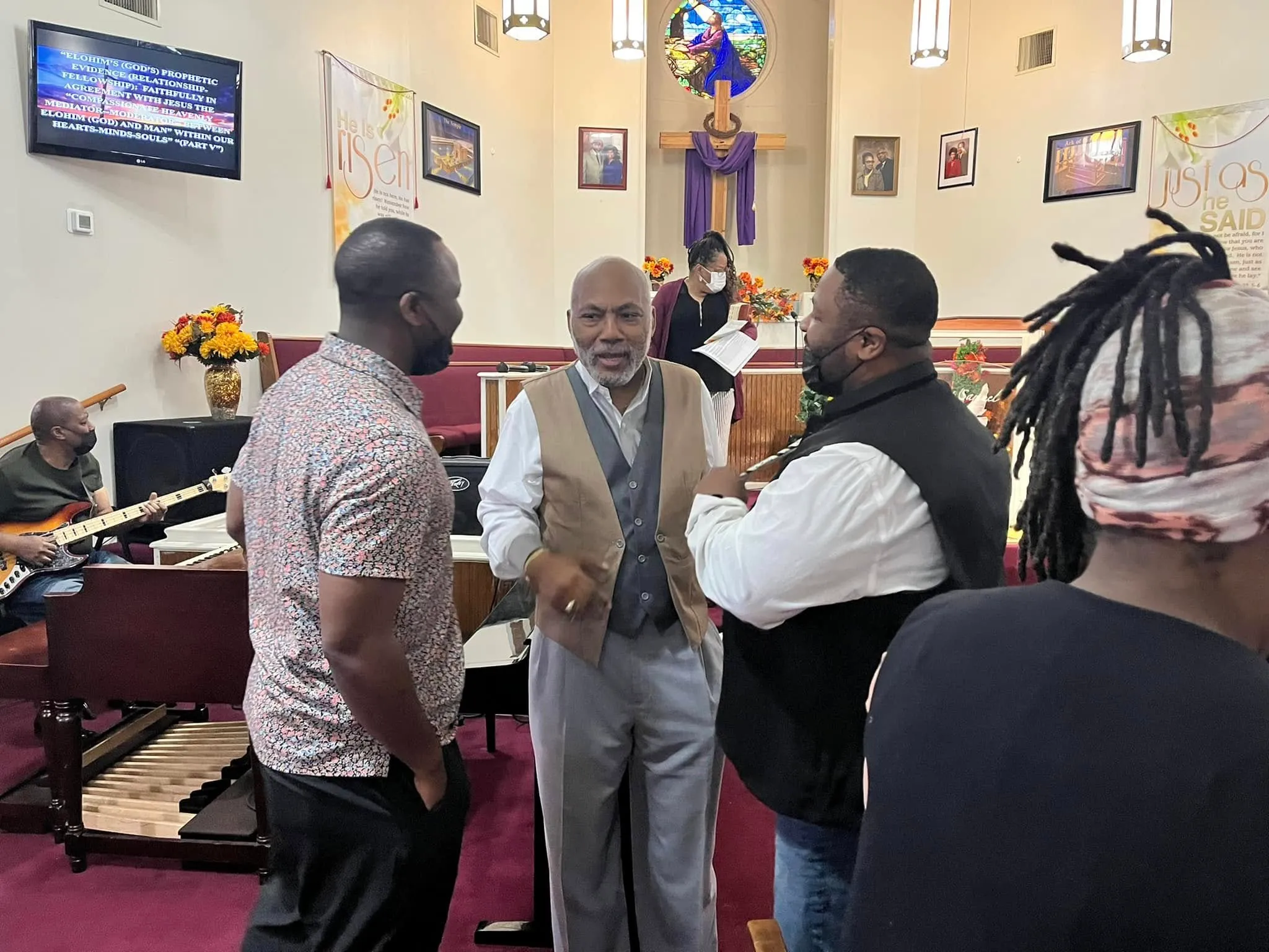 Fellowship in the sanctuary before Sunday service